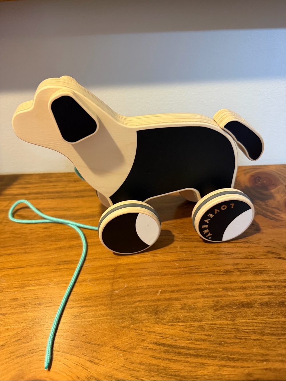 Lovevery wooden pull dog